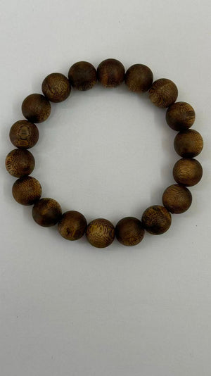 Dark agarwood bead bracelet with fine oil vein texture on white surface
