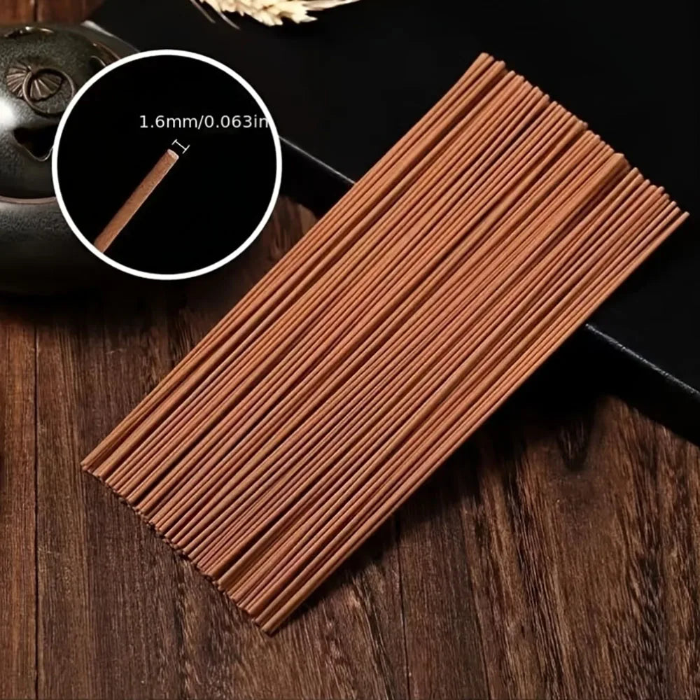 A Box of 500 Incense Sticks, 21cm Long, with the Scent of Sandalwood and Medicinal Mugwort, Suitable for Aromatherapy. They Are Placed on a Wooden Board, and the Board Is Placed on a Support Beam. Home Decor Products for Kitchens, Bedrooms, Offices, Yoga,