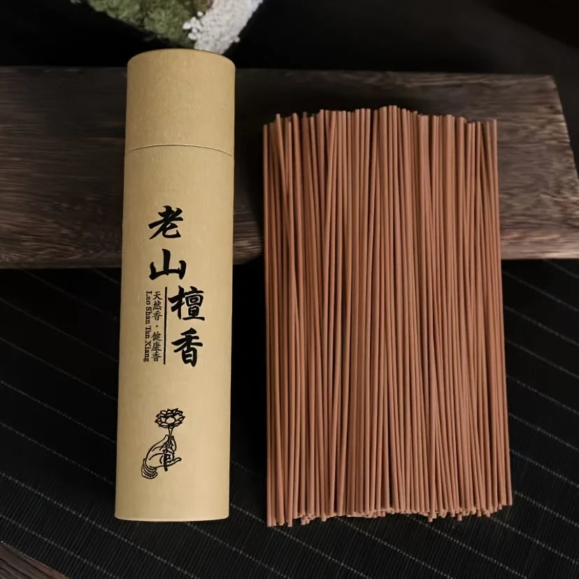A Box of 500 Incense Sticks, 21cm Long, with the Scent of Sandalwood and Medicinal Mugwort, Suitable for Aromatherapy. They Are Placed on a Wooden Board, and the Board Is Placed on a Support Beam. Home Decor Products for Kitchens, Bedrooms, Offices, Yoga,