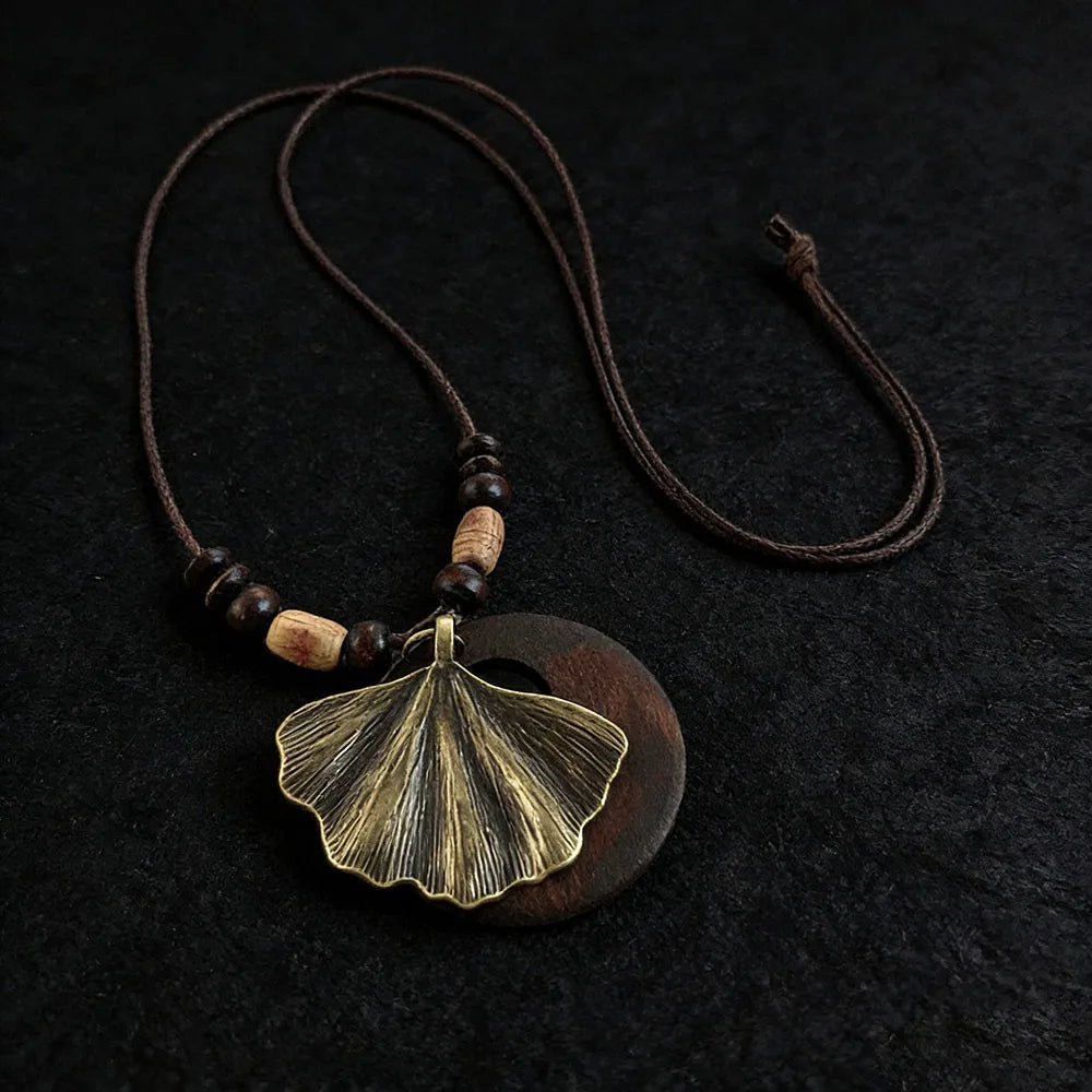 Vintage Boho Sweater Chain Hollow Leaves Leather Chain Wooden Pendant Necklace Handmade Long Clothing Pendant Gifts