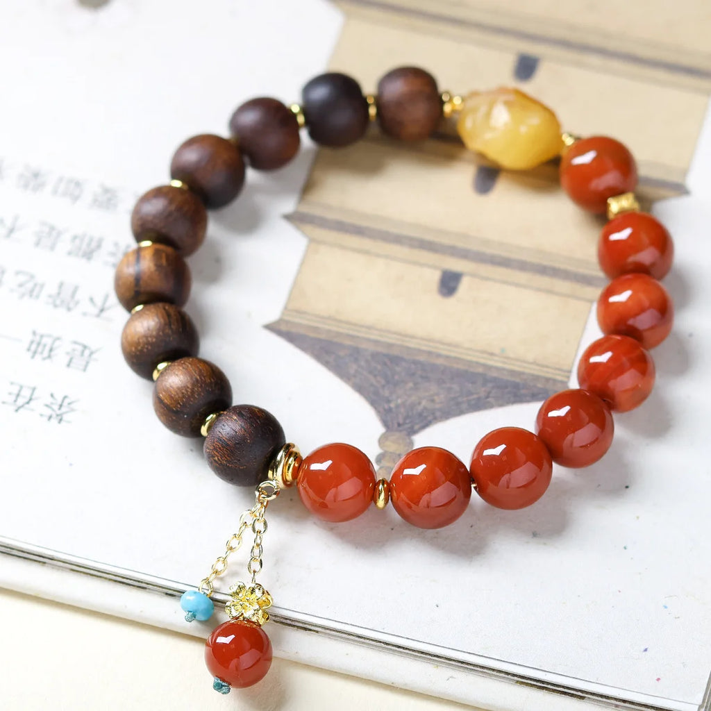 Huang Qinan agarwood bracelet paired with raw amber stones, new Chinese style, combined with Southern red agate, a dual-piece de