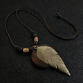 Vintage Boho Sweater Chain Hollow Leaves Leather Chain Wooden Pendant Necklace Handmade Long Clothing Pendant Gifts