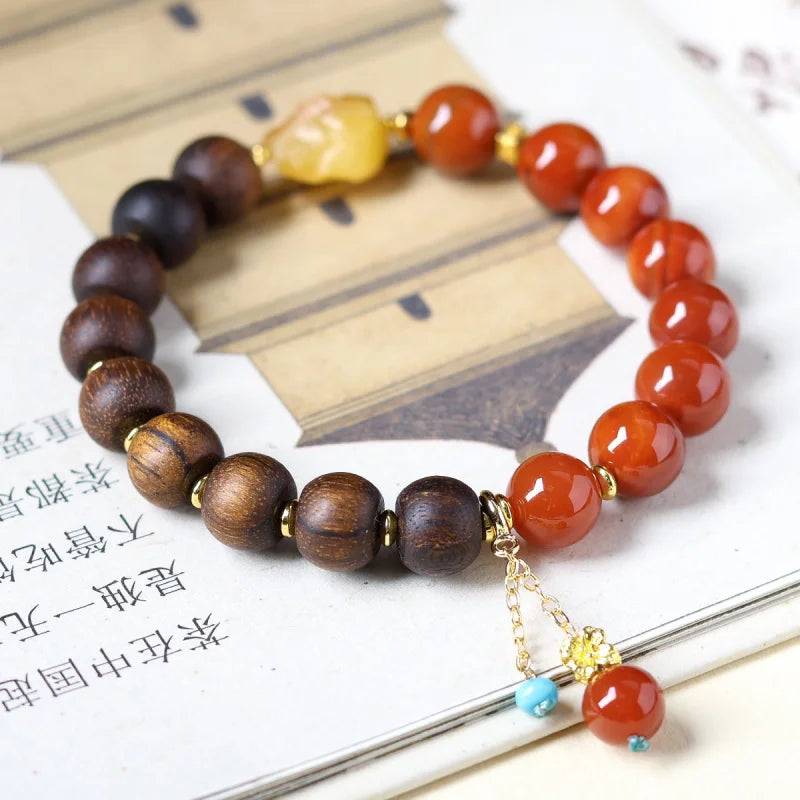 Huang Qinan agarwood bracelet paired with raw amber stones, new Chinese style, combined with Southern red agate, a dual-piece de