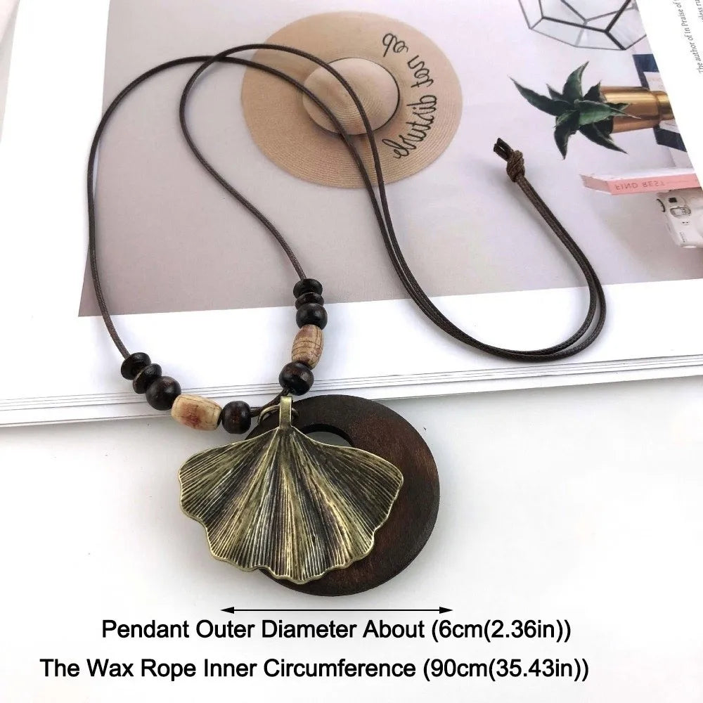 Vintage Boho Sweater Chain Hollow Leaves Leather Chain Wooden Pendant Necklace Handmade Long Clothing Pendant Gifts